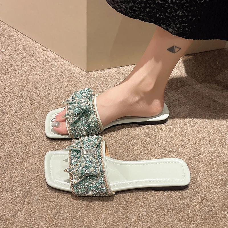 Fashion Women Summer Slippers 2025 New Luxury Design Crystal Pearl Bowknot Ladies Fashion Sandals Plus Size Women Flip Flops Flat Shoes