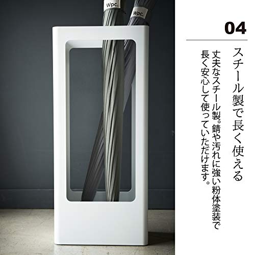 Slim, thin, Scandinavian-inspired umbrella stand for entryways. Tower design, simple, available in white and black. Yamazaki Industries (white).