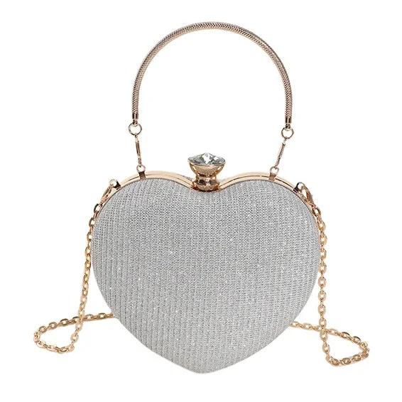 Borsa da sera con pochette, borsa da donna, borsa a mano lucida, a forma di cuore, in metallo, borsa a tracolla con catena alla moda, borsa di lusso da donna.