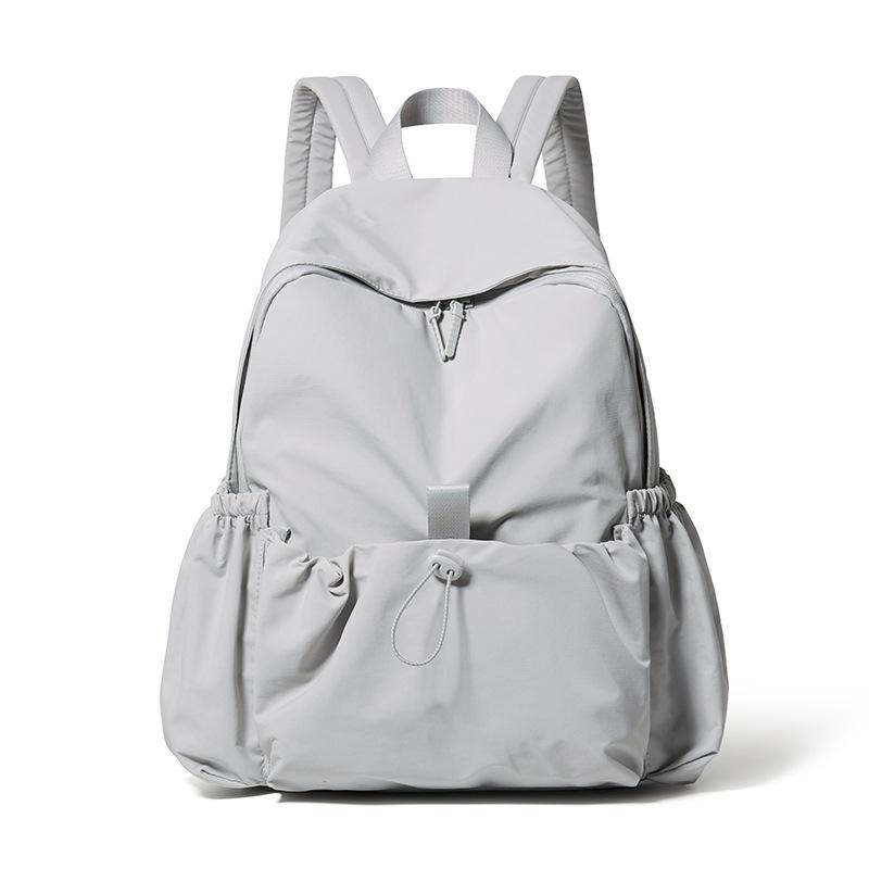 Schoolbag new Korean version casual large-capacity student backpack men's and women's 1011 light outdoor sports mountaineering bag