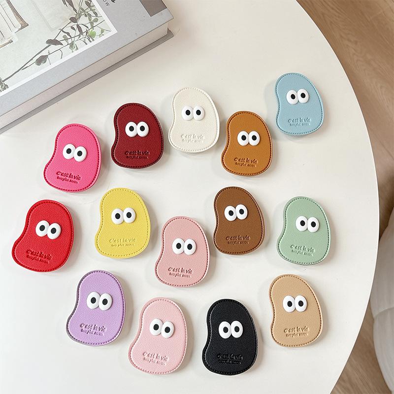 Cute Big Eyes Solid Color Cashew Leather Mobile Phone Airbag Bracket Retractable Simple Japanese Small Fresh Ring