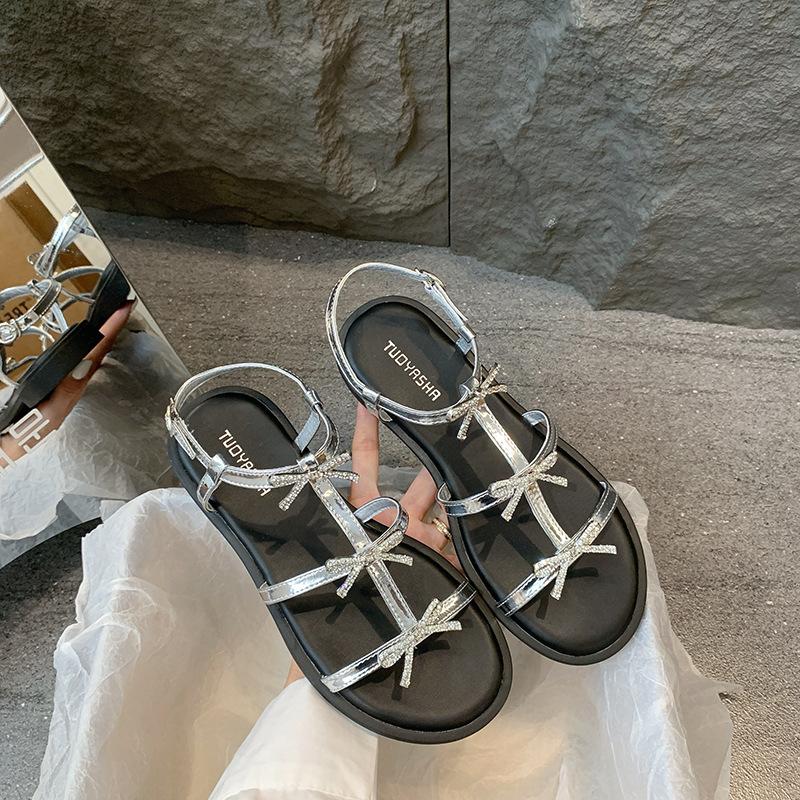 

Beautiful sandals are not tired of foot design, niche black bow strap flat shoes for women 40 серебряный