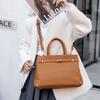 Sac à main polyvalent style Kelly en cuir véritable Dou Xiaozhu