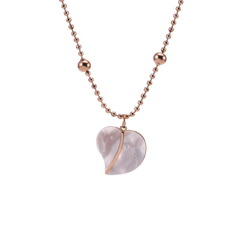 Elegant Gold Titanium Steel Women's Necklace with White Shell, Zircon, and Monogram Tassel