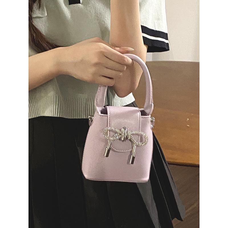 

Sweet bow handbag women s 2025 new Korean version chain bucket bag versatile messenger bag dinner bag фиолетовый