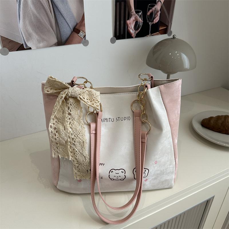 

Милая женская сумка 2025 новая сумка большой вместимости женская универсальная нишевая зарубежная модная плечевая сумка-тоут Without pendant розовый