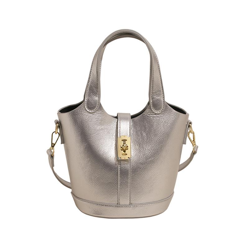 This Year's Popular Fashion Korean Version of Simple Solid Color Portable Bucket Bag Women's Casual Versatile Commuter Messenger Child and Mother Bag
