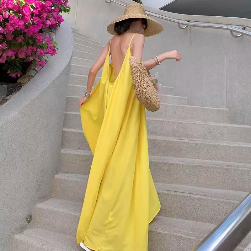 Seaside Vacation Sexy Backless Suspender Dress Women's Summer New Loose A-word Skirt Gentle Yellow Long Skirt