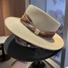 New spring and summer French elegant flat-top woven straw hat women's retro top hat sun protection seaside vacation beach sun hat