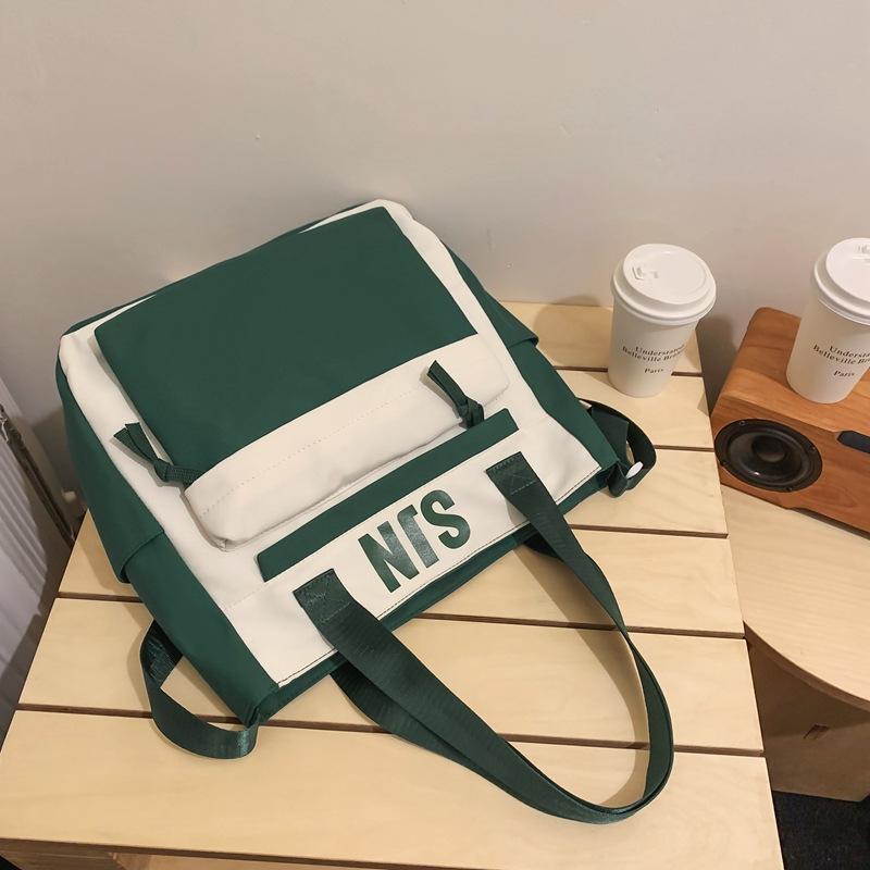 Schoolbag Japanese simple and fashionable backpack 1011 summer new middle school schoolbag college student college style alphabet backpack