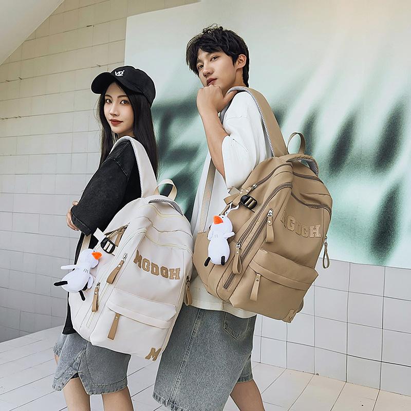 School bag, large capacity, multi-layer, junior high school boys and girls, backpack, burden reduction, spine protection, lightweight