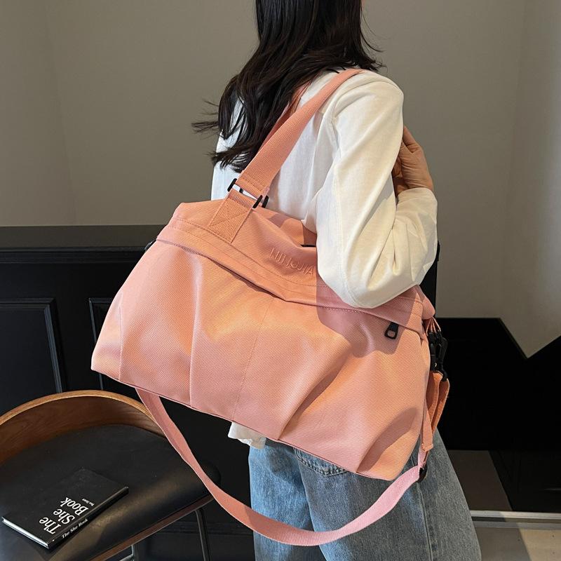 High-value short-distance travel bag women's new trendy and textured business trip duffel bag simple large-capacity sports fitness bag