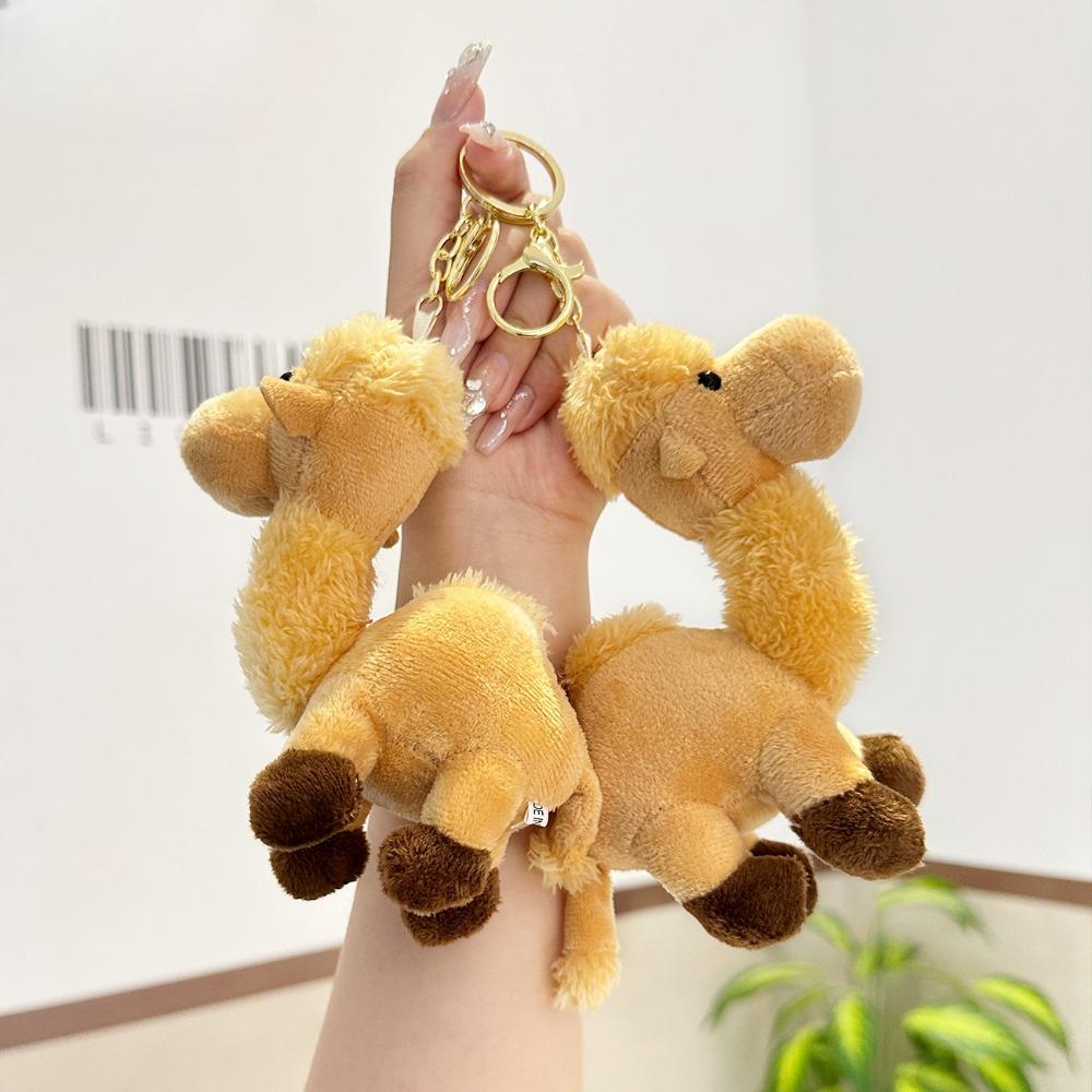 Plysch kamel nyckelring, söt kvinnlig docka, dockhänge, utsökt ryggsäck, bilnyckelring