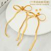 Long tassel bow earrings titanium steel gold-plated chain bow pendant earrings niche design