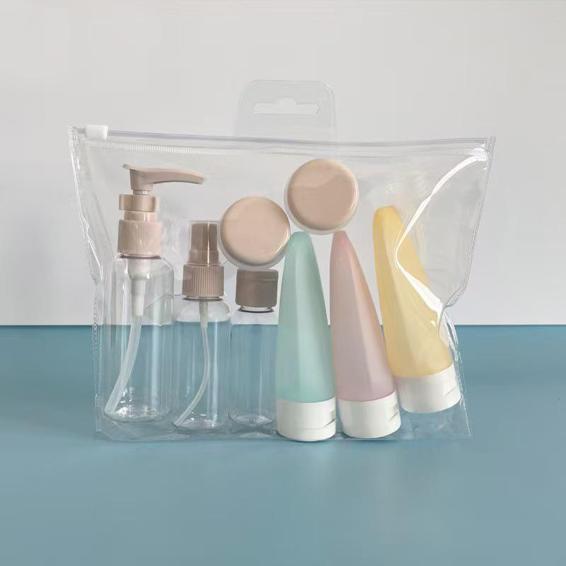 Portable Travel Cosmetic Bottling Set: Spray Bottle, Shower Gel, Lotion, Cream, and Perfume Containers.