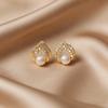 Light luxury pearl stud earrings women's niche design sense love bow earrings versatile earrings commuting