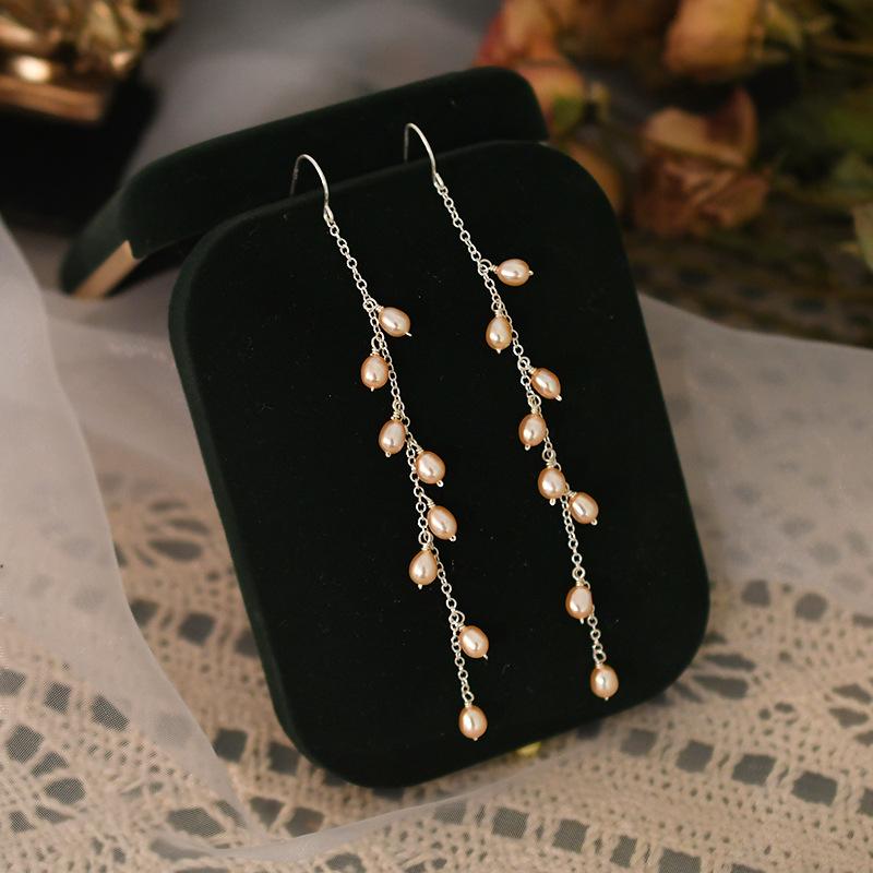 

Freshwater pearl silver fringed long earrings fairy round face thin sweet temperament versatile fashion earrings помаранчевий
