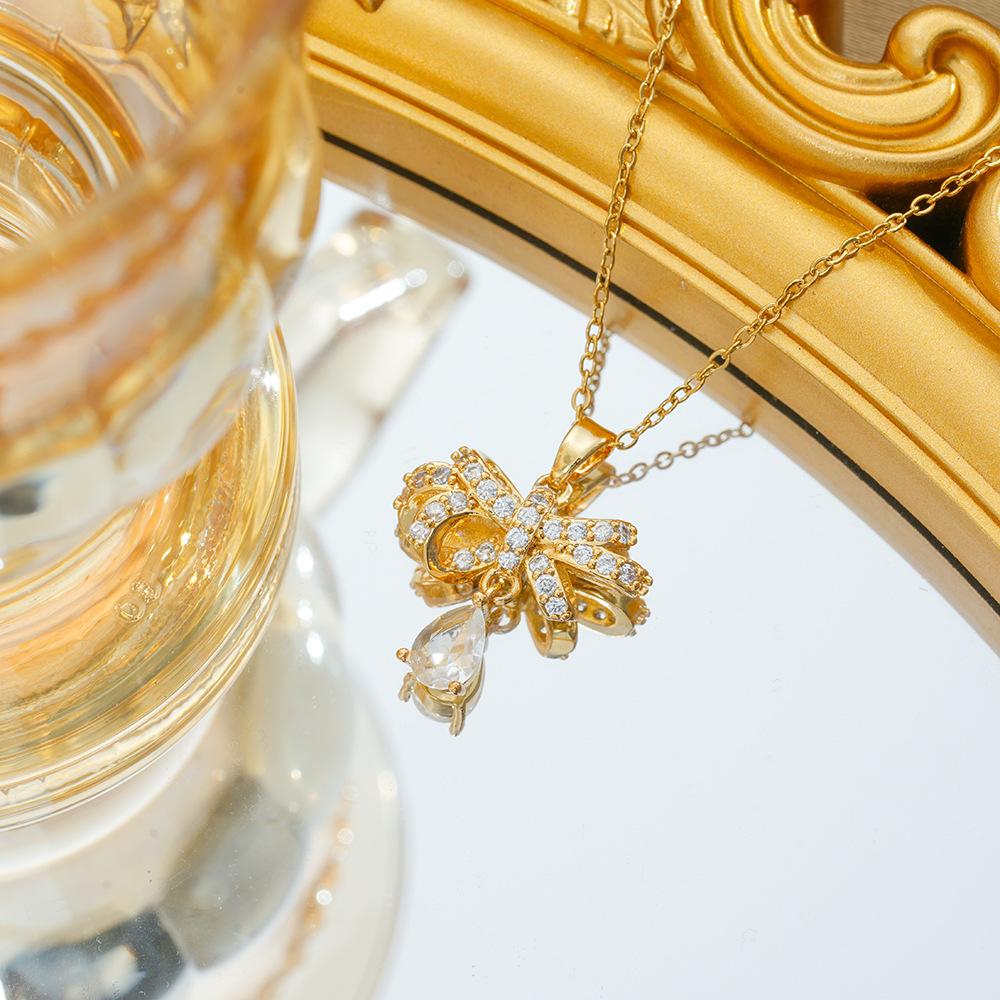 Conjunto de Colar e Brincos de Zircônia de Luxo Leve de Nicho com Diamante Brilhante em Forma de Laço para Mulheres