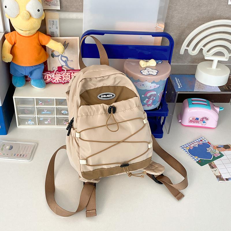 Outdoor travel bag mini fashion small backpack new Korean light boys and girls backpack junior high school hiking bag