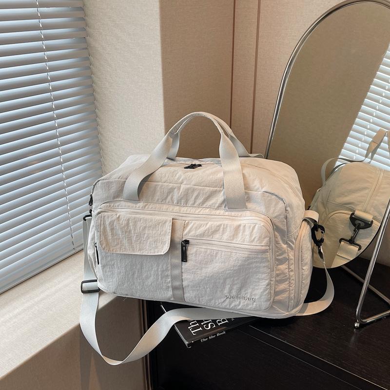 

Large capacity portable short-haul travel bag Women s fashion lightweight luggage bag Men s travel storage Sports fitness bag бежевый