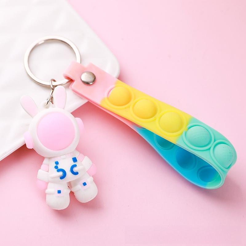 

Cartoon astronaut keychain, cute schoolbag tag, anti-lost astronaut and space rabbit figurine, couple pendant accessories рожевий