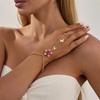 Neuer Exquisiter Süßer Schmetterlingsblumen-Fingerarmreif für Damen Retro Tropföl Blumen-Charme-Armbänder Schmuck Handaccessoire