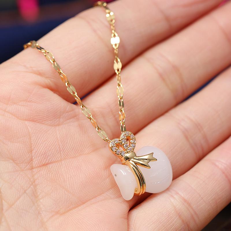 Chinese style imitation Hetian jade safety buckle necklace women's retro temperament titanium steel clavicle chain gold inlaid jade pendant with