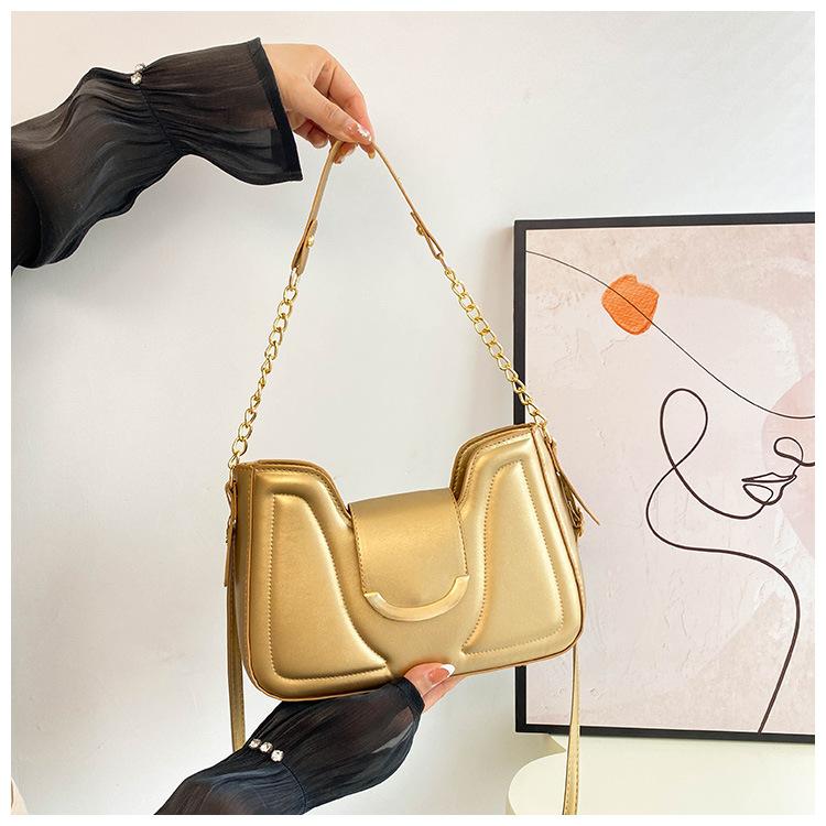 

2024 нова французька нішева жіноча сумка під пахви, модна сумка під пахви з замком Crescent, високоякісну сумку-месенджер на одне плече золотий