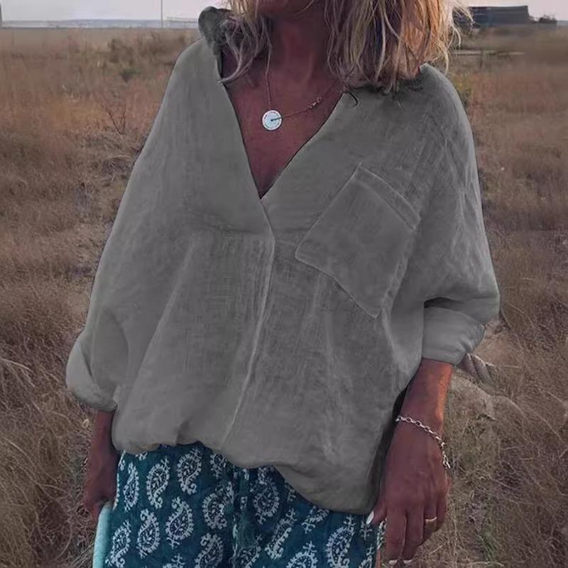 Pevná dámská halenka s dlouhým rukávem a výstřihem do V