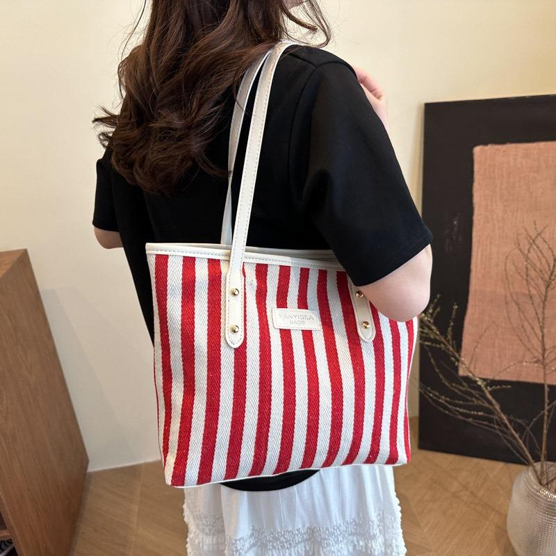 Large-capacity simple striped shoulder bag fashionable contrasting color handbag new casual and beautiful underarm bag