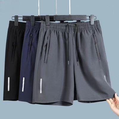 Pantaloncini sportivi da uomo tinta unita dritto elastico in vita abbigliamento casual quotidiano taglie forti tasche con cerniera retrò sottili al ginocchio pantaloncini estivi abbigliamento da uomo