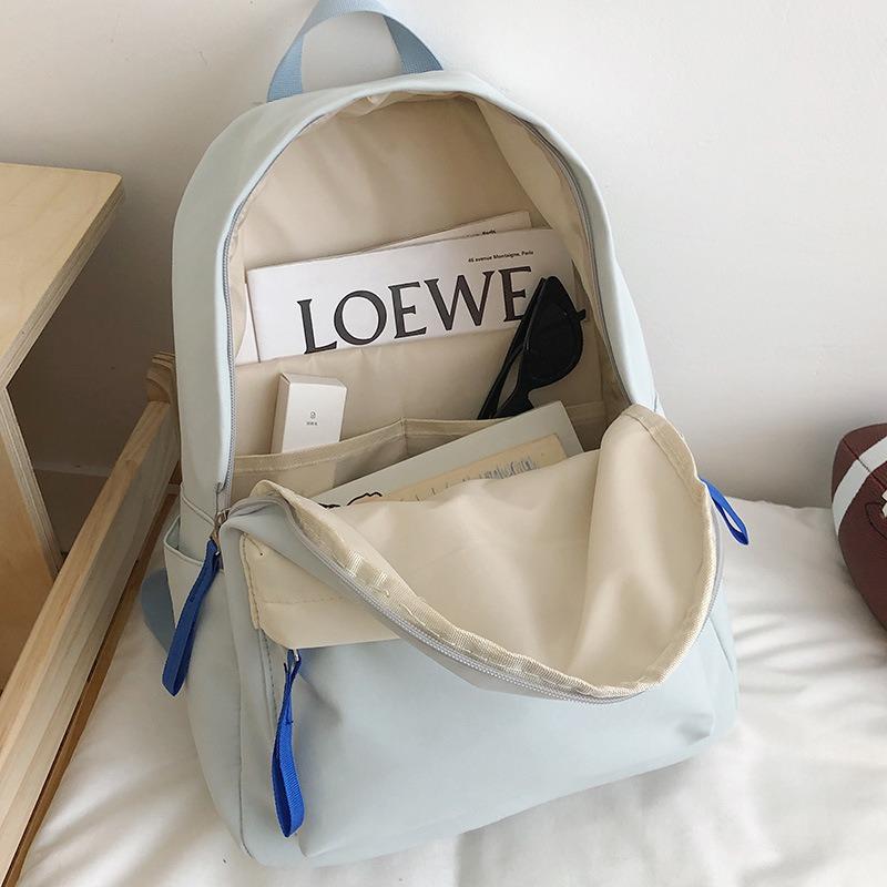 High value, fresh and sweet contrasting color backpack, light and multi-pocket backpack for primary and secondary school students