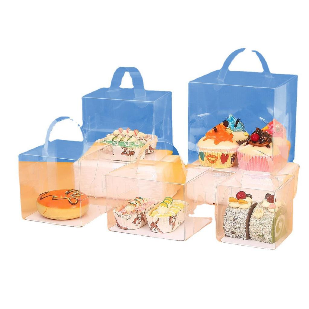 Transparentes weißes Kartontablett mit PET-Kunststoff für Kuchen, Kekse, Süßigkeiten, Backwaren und knusprige Schokoladen-Schneeflocken.