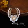 Elegant Pearl U-shaped Plum Blossom Brooch Pin - Versatile Corsage Accessory for Dresses and Coats