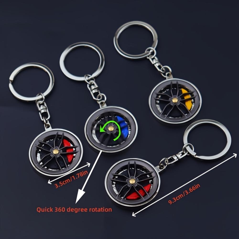 Metallbremsradnabe drehen integrierte Pistole schwarzer Schlüsselanhänger Weihnachtsgeschenk Mercedes-Benz Radnaben-Bremssattel-Schlüsselanhänger