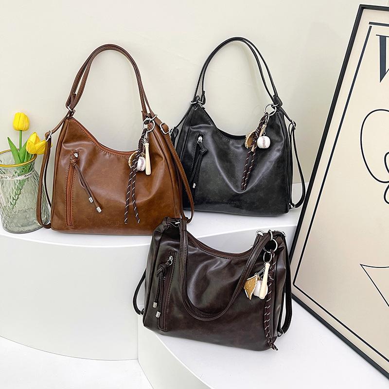 Borsa a tracolla retrò da donna: Zaino e borsa da viaggio capienti e versatili.
