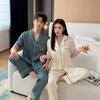 New Spring and Summer Ice Silk Pajamas Men's and Women's Jacquard Pockets, Hot Diamonds, Short Sleeves, Trousers, Simulated Silk Large Size