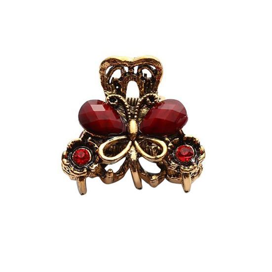 

Металлическая заколочка крабик в виде бабочки.Четыре расцветки на выбор красный