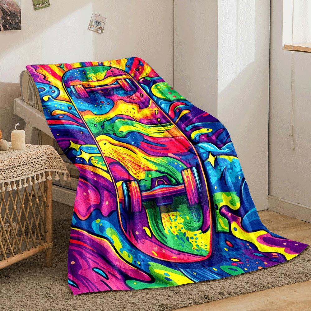 Vivid swirling patterns in rainbow colors surrounding a skateboard design. for all seasons blanket lunch break throw gift