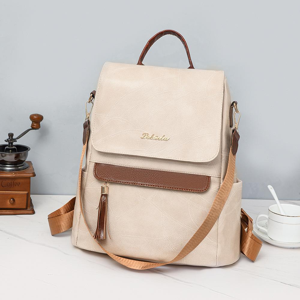 Женский многофункциональный рюкзак из мягкой кожи с кисточками в стиле ретро — фото 3