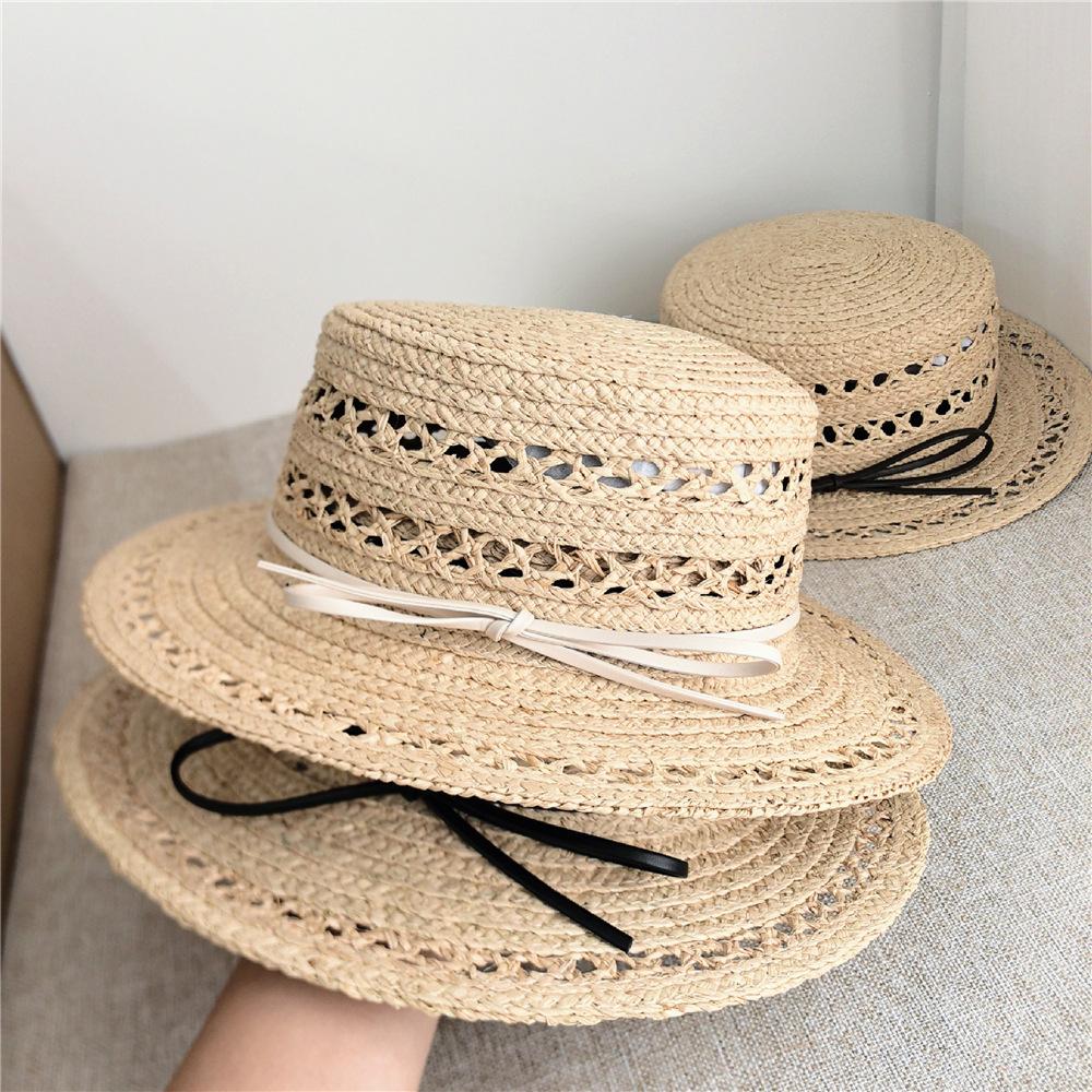 Women Raffia hat French style Summer Straw Sun Hat Women Wide Brim Beach Cap Breathable Hollow Holiday Panama hat Leather Bow