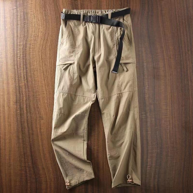 Pánské větruodolné a voděodolné outdoorové kalhoty softshell, zimní ležérní střih straight fit se sametovou podšívkou a mnoha kapsami