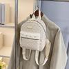 Schoolbag fashion PU travel small backpack storage Korean version lady temperament rivet small backpack trend small backpack