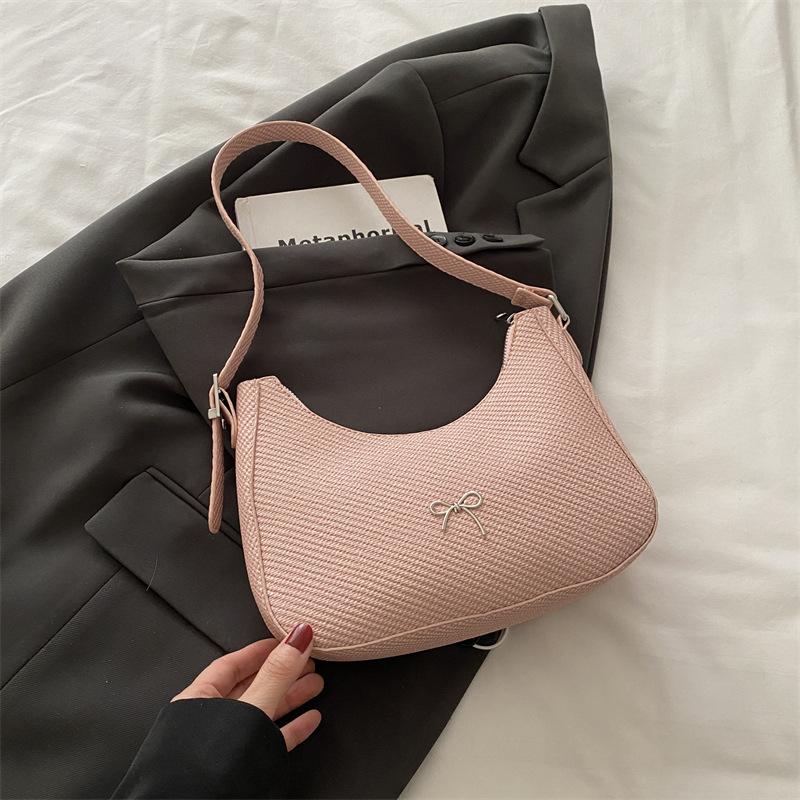 

2025 новый трендовый нишевый дизайн простой французский нишевый дизайн сумка-багет на одно плечо женская сумка-полумесяц-пельмень на одно плечо розовый