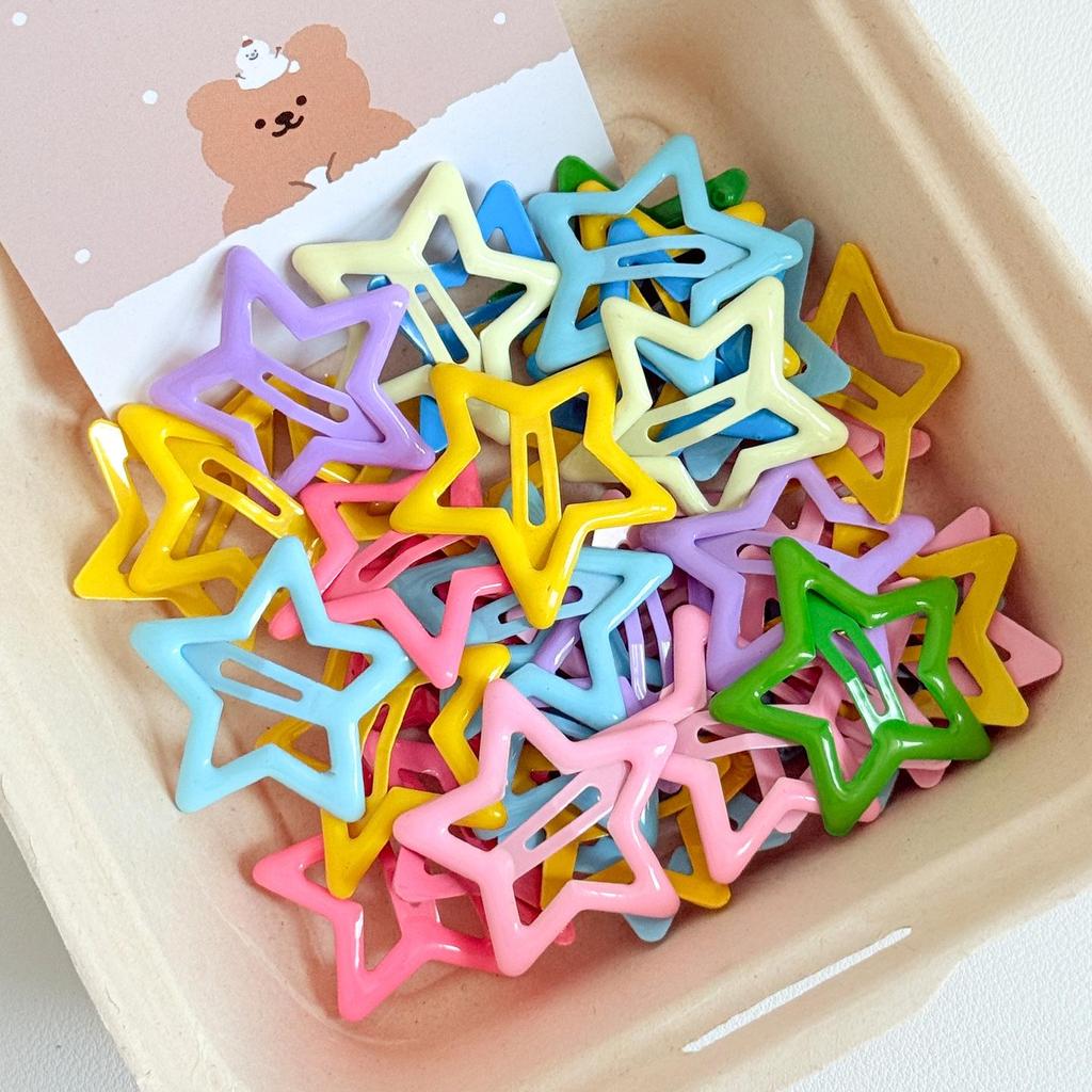Y2K Star Hair Clips: Cute Five-Pointed Star Accessories for Kids' Side Bangs.