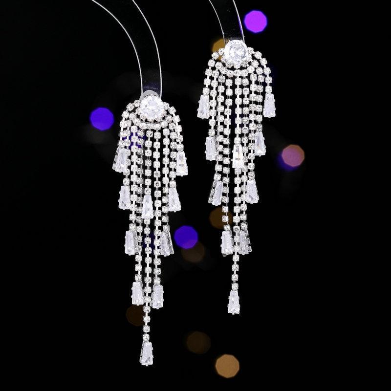 

S925 silver needle super fairy temperament high-end zircon inlaid earrings long face thin fringed earrings серебряный
