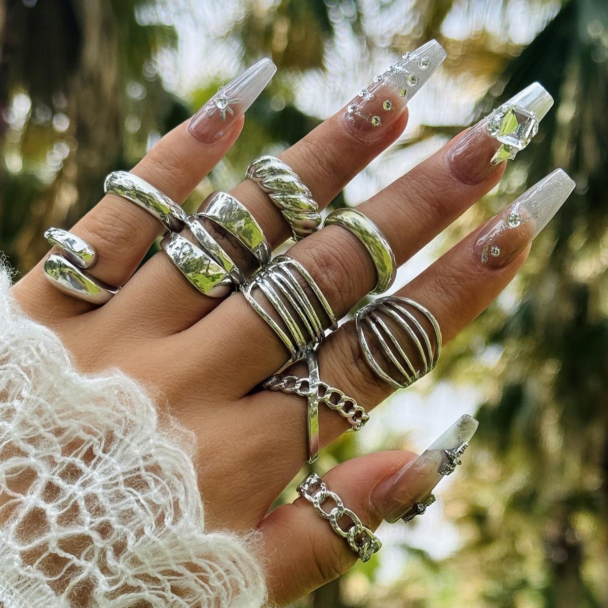 

Accessories: European and American exaggerated punk style cross-joint ring set creative geometric ring nine-piece set for women