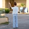 Summer new fashion design sense Muse temperament lace splicing two sides wear vest wide leg pants three-piece women