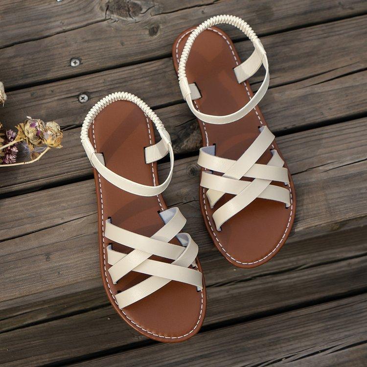 

2025 Винтажные римские повседневные сандалии с открытым носком и перекрестными ремешками на плоской подошве в европейском и американском стиле с плетеной пряжкой с одним словом 43 бежевый