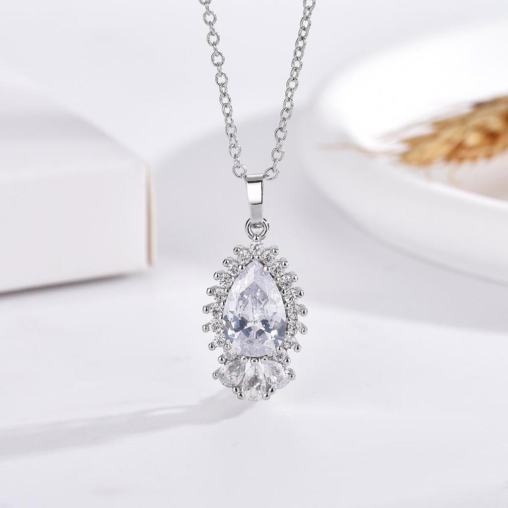 Minimalist Water Drop Zircon Jewelry Set: Pendant Clavicle Necklace, Stud Earrings, Adjustable Pear-Shaped Ring